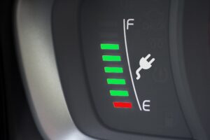 Fuel gauge/battery life meter of an electric car for "What Drains an Electric Car Battery the Most?" blog.